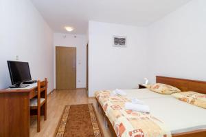 Postel nebo postele na pokoji v ubytování Rooms Karla