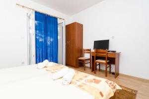 Postel nebo postele na pokoji v ubytování Rooms Karla