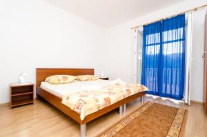 Postel nebo postele na pokoji v ubytování Rooms Karla