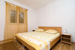 Postel nebo postele na pokoji v ubytování Rooms Karla