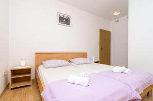 Postel nebo postele na pokoji v ubytování Rooms Karla