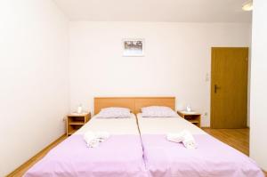 Postel nebo postele na pokoji v ubytování Rooms Karla