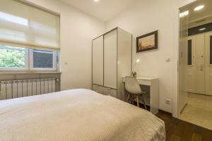 Posteľ alebo postele v izbe v ubytovaní Apartment Toma