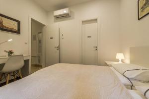 Posteľ alebo postele v izbe v ubytovaní Apartment Toma