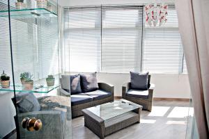 Posezení v ubytování Maison Lumière