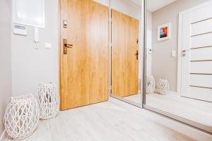 Łóżko lub łóżka w pokoju w obiekcie Apartment No. 1 - Vento Apartamenty
