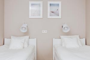 Łóżko lub łóżka w pokoju w obiekcie Apartment No. 1 - Vento Apartamenty