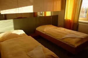 Voodi või voodid majutusasutuse Hotel Solitaire toas