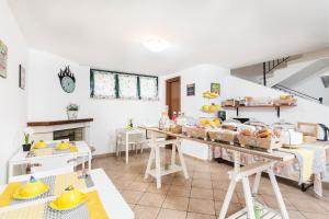 a kitchen with a lot of food on display at Hotel La Villetta in Fiumicino