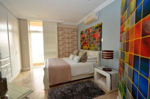 Giường trong phòng chung tại 703 Oyster Schelles - by Stay in Umhlanga