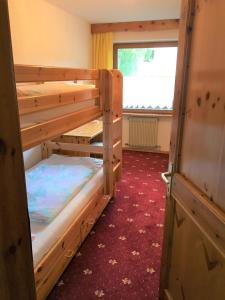 Postel nebo postele na pokoji v ubytování Sonnhof