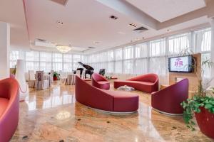 TV a/nebo společenská místnost v ubytování Best Western Hotel Rocca
