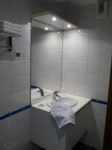 Salle de bains dans l'établissement Hôtel Restaurant Du Chalet