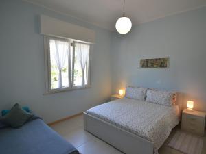 Postel nebo postele na pokoji v ubytování Apartment in Gatteo near Adriatic Beach