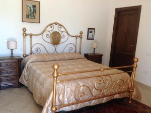 Säng eller sängar i ett rum på Villa Trieste