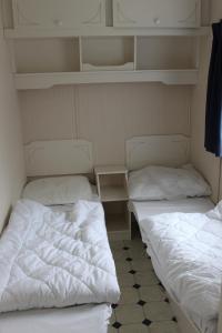 Bunk bed o mga bunk bed sa kuwarto sa De Stacaravan
