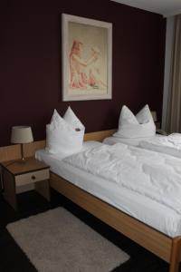 Postel nebo postele na pokoji v ubytování Osterberg - Restaurant und Hotel