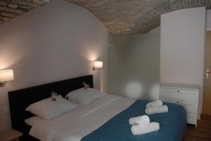 Posteľ alebo postele v izbe v ubytovaní Old Town Inn