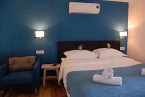 Posteľ alebo postele v izbe v ubytovaní Old Town Inn