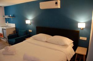Posteľ alebo postele v izbe v ubytovaní Old Town Inn