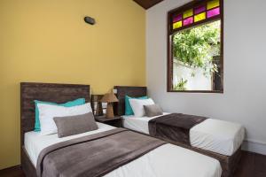 Tempat tidur dalam kamar di Rope Walk Guest House