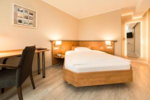 Postel nebo postele na pokoji v ubytování Hotel Spree-idyll