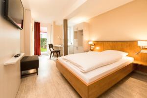 Postel nebo postele na pokoji v ubytování Hotel Spree-idyll