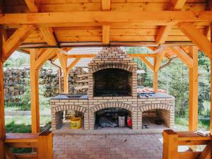 Fotografie z fotogalerie ubytování Riverside Woodhouses v destinaci Praid