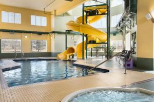 The swimming pool at or close to Super 8 by Wyndham Calgary Shawnessy Area