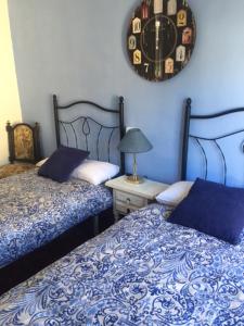 Ένα ή περισσότερα κρεβάτια σε δωμάτιο στο Apartamento Turísticos Luar 3