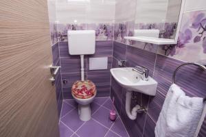 Kúpeľňa v ubytovaní Aparment Jomarko + 22 fotografií