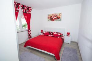 Posteľ alebo postele v izbe v ubytovaní Aparment Jomarko