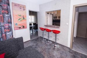 Kuchyňa alebo kuchynka v ubytovaní Aparment Jomarko