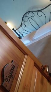 Postel nebo postele na pokoji v ubytování B&B Da Giua'