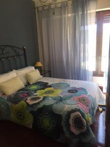 Posteľ alebo postele v izbe v ubytovaní Apartamentos Turísticos Luar II