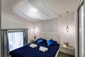 Posteľ alebo postele v izbe v ubytovaní Suites 13 Budapest