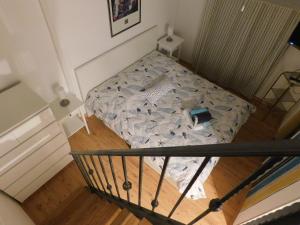 Łóżko lub łóżka w pokoju w obiekcie Gina Bed & Breakfast