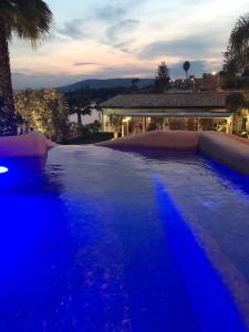 Bazén v ubytování Calapetra Resort nebo v jeho okolí