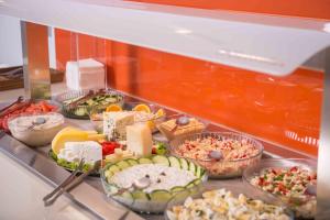 a buffet line with many different types of food at Balos Beach in Kissamos