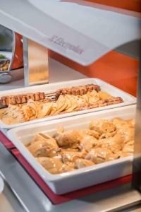 a tray of food on a shelf in a refrigerator at Balos Beach in Kissamos