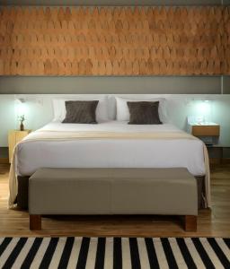 Кровать или кровати в номере Hotel Arenales