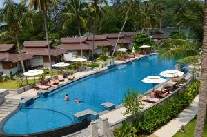 an overhead view of a swimming pool at a resort at Maehaad Bay Resort - SHA Plus in Mae Haad