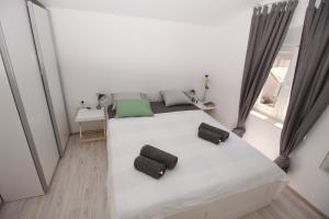 Postel nebo postele na pokoji v ubytování Apartment Smokva ****