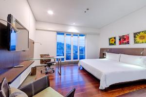 Μια τηλεόραση ή/και κέντρο ψυχαγωγίας στο Hotel Spiwak Chipichape Cali