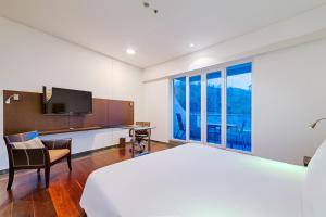 Μια τηλεόραση ή/και κέντρο ψυχαγωγίας στο Hotel Spiwak Chipichape Cali