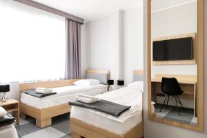 TV a/nebo společenská místnost v ubytování Waw Hotel Airport Okęcie