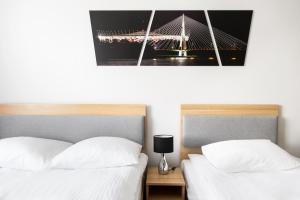 Postel nebo postele na pokoji v ubytování Waw Hotel Airport Okęcie