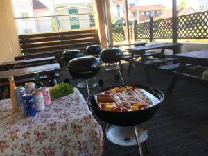 a table with a bowl of food on a deck at Venus Motel in Boryeong +24 photos