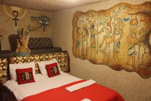 Cama o camas de una habitación en Stay In Peace Cave Hostel