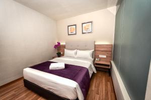 Postel nebo postele na pokoji v ubytování BIG M Hotel + 37 fotografií
